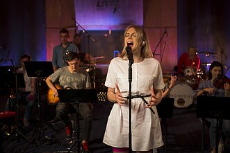 Monique repeticijos su orkestru akimirka