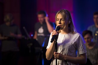 Monique repeticijos su orkestru akimirka