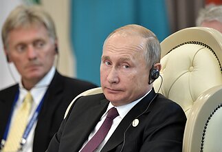Dmitrijus Peskovas ir Vladimiras Putinas Dmitrijus Peskovas ir Vladimiras Putinas