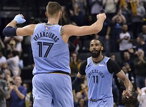 Jonas Valančiūnas  and Mike Conley