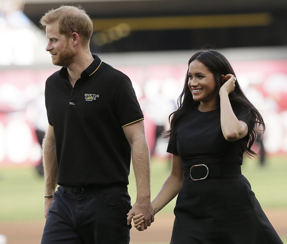 Princas Harry ir Meghan Markle su beisbolininkais Princas Harry ir Meghan Markle su beisbolininkais
