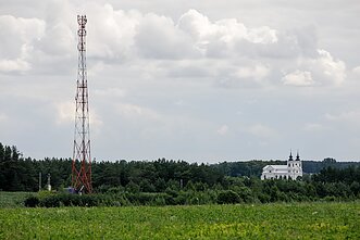 Lietuvos ir Baltarusijos pasienis šalia Tribonių (matosi Šv. Jono Krikštytojo bažnyčia Baltarusijoje, Benekainyse)