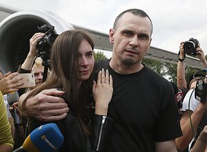 Oleg Sentsov and other Ukrainian detainees return home after a prisoner-swap with Russia