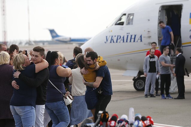 Ukrainian detainees return home after a prisoner-swap with Russia