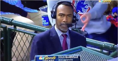 The US baseball club Chicago Cubs banned a supporter from its stadium for life for displaying the same sign behind a black man during a game. The US baseball club Chicago Cubs banned a supporter from its stadium for life for displaying the same sign behind a black man during a game.