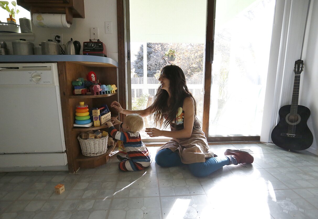 AP nuotr., Mama su vaiku