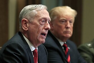 James Mattis with US President Donald Trump in the background James Mattis with US President Donald Trump in the background