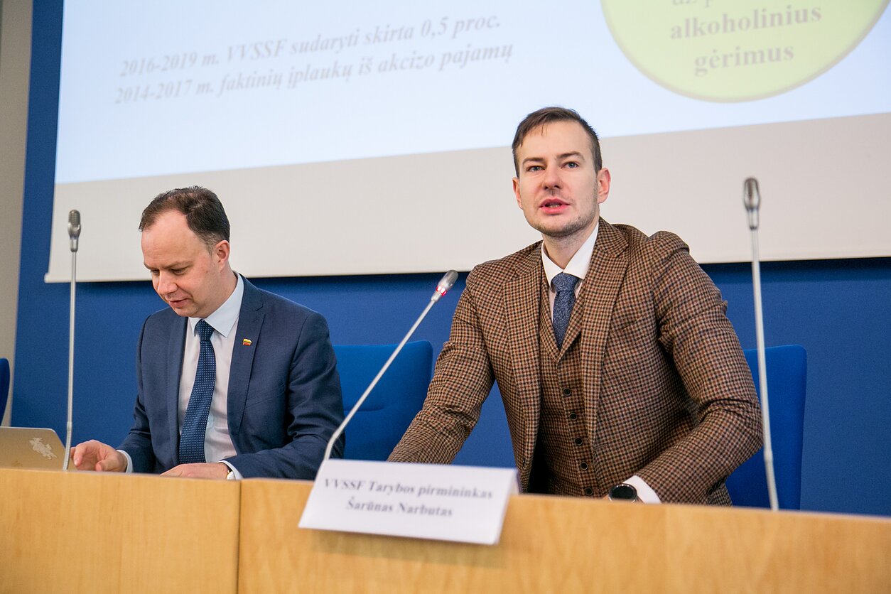 Šarūnas Narbutas, right, seen next to Health Minister Aurelijus Veryga