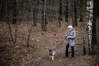 Algimantė Jurgelevič and her 17-year-old companion Lord takes a walk near Fabijoniškės Social Service Home Algimantė Jurgelevič and her 17-year-old companion Lord takes a walk near Fabijoniškės Social Service Home
