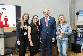 Protmūšis organisers with Ambassador Nerijus Aleksiejūnas at the Lithuanian Community Event in Paris
