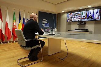 President of the European Council Charles Michel participates in a video call with world leaders.