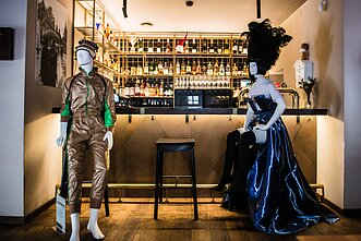 Mannequins fill empty tables in Vilnius’ cafes to keep physical distance.
