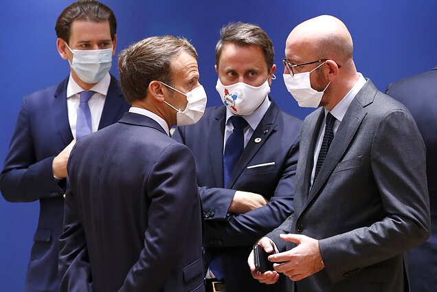 Austria's Chancellor Sebastian Kurz, French President Emmanuel Macron, Luxembourg's Prime Minister Xavier Bettel and European Council President Charles Michel speak during a round table meeting at an EU summit Austria's Chancellor Sebastian Kurz, French President Emmanuel Macron, Luxembourg's Prime Minister Xavier Bettel and European Council President Charles Michel speak during a round table meeting at an EU summit