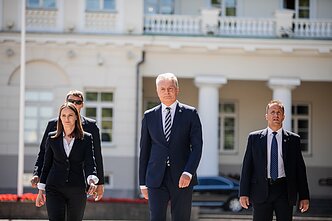 President Gitanas Nausėda and his entourage