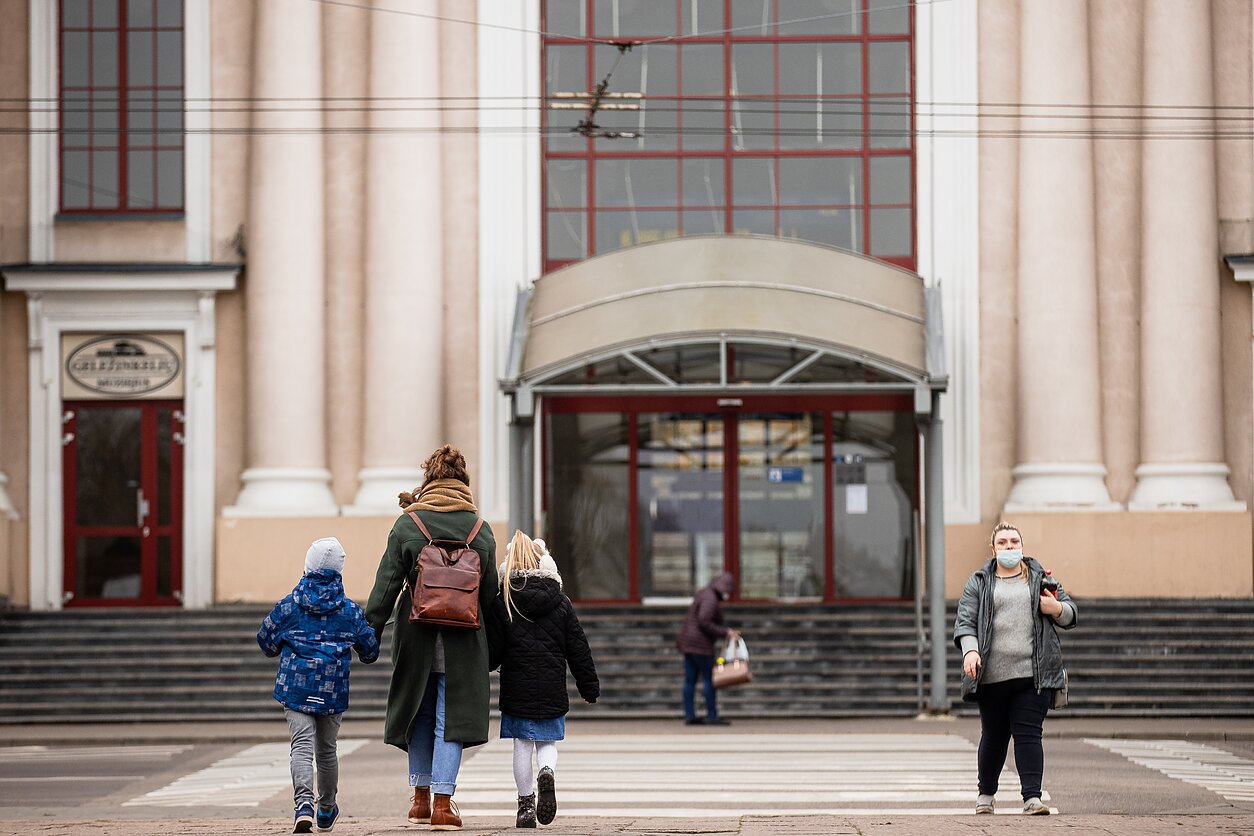People wear facemasks in Vilnius People wear facemasks in Vilnius