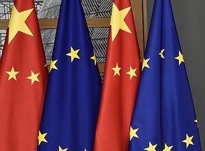The flags of China and the European Union.