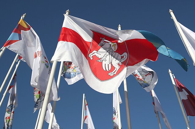 The historical white-red-white Belarusian flag, associated with the country's opposition, hoisted in Riga.