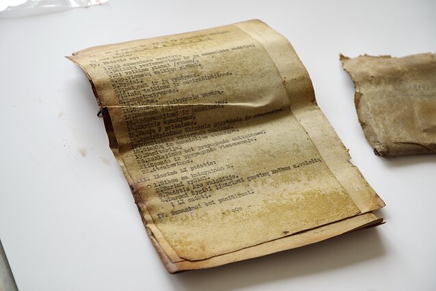 Researchers discover gas mask bag in Lithuania containing partisan documents.