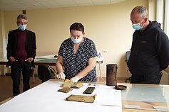 Researchers discover gas mask bag in Lithuania containing partisan documents.