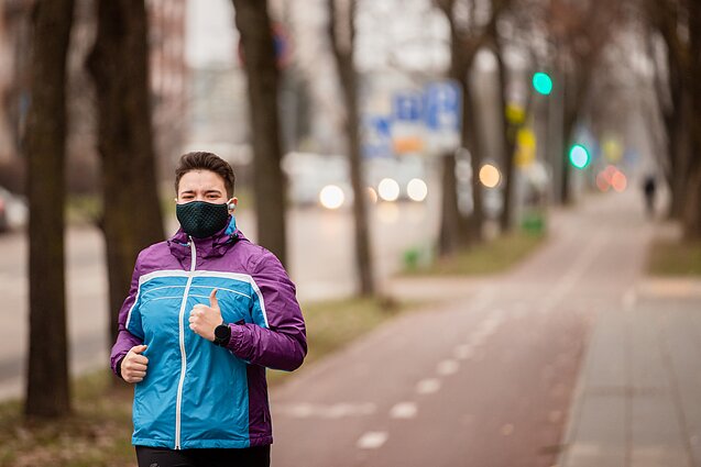 A jogger with a facemask in Vilnius A jogger with a facemask in Vilnius