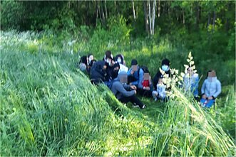 A group of people detained after crossing the border from Belarus on June 11.