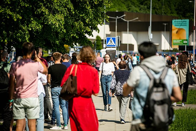 People queuing outside a vaccination centre in Vilnius