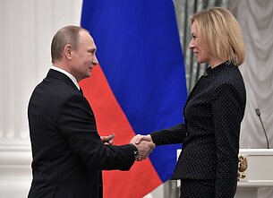 Marija Zacharova ir Vladimiras Putinas