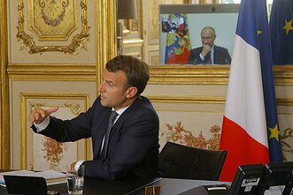 Emmanuelis Macronas ir Vladimiras Putinas