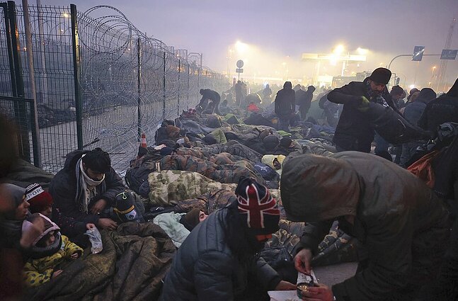 Žinios. Iš Minsko namo išskraidinti keli šimtai irakiečių migrantų