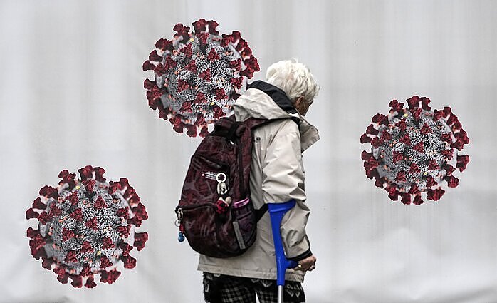 Vokietijoje skelbiamas nepasiskiepijusių karantinas: bus leidžiama lankytis tik būtinųjų prekių parduotuvėse