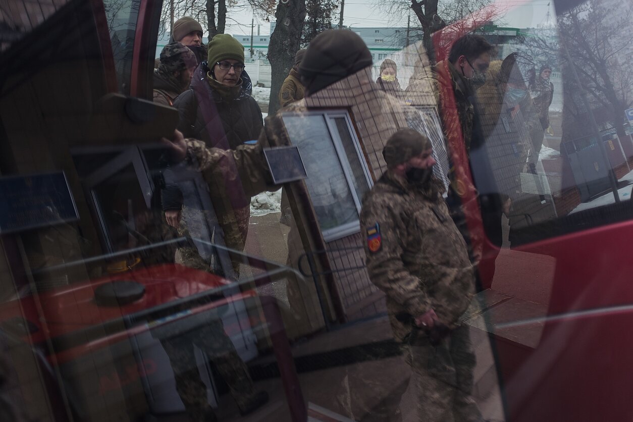 Members of the force load up their vehicle with equipment needed for training