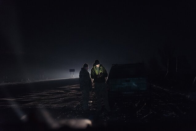 Two operatives exchange intelligence information.