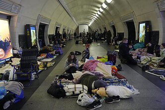 People hiding from Russia's airstrikes in Kyiv metro