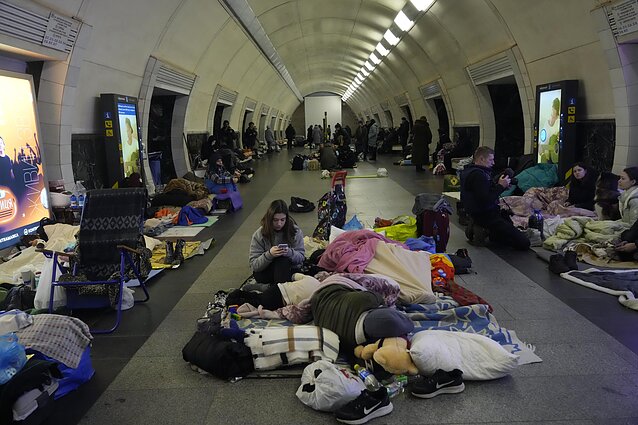 People hiding from Russia's airstrikes in Kyiv metro