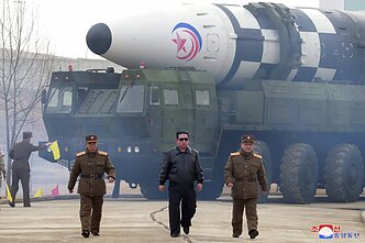 Kim Jong Un watches a ballistic missile test