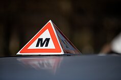 Mokomojo automobilio ženklas