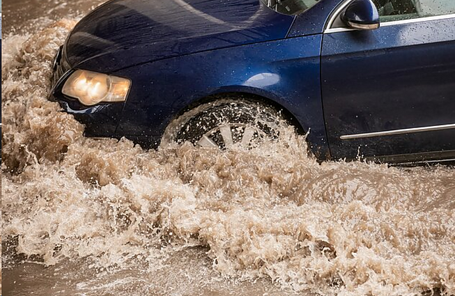 Panorama. Stiprus lietus užtvindė dalies radviliškiečių namus, kiemus ir daržus