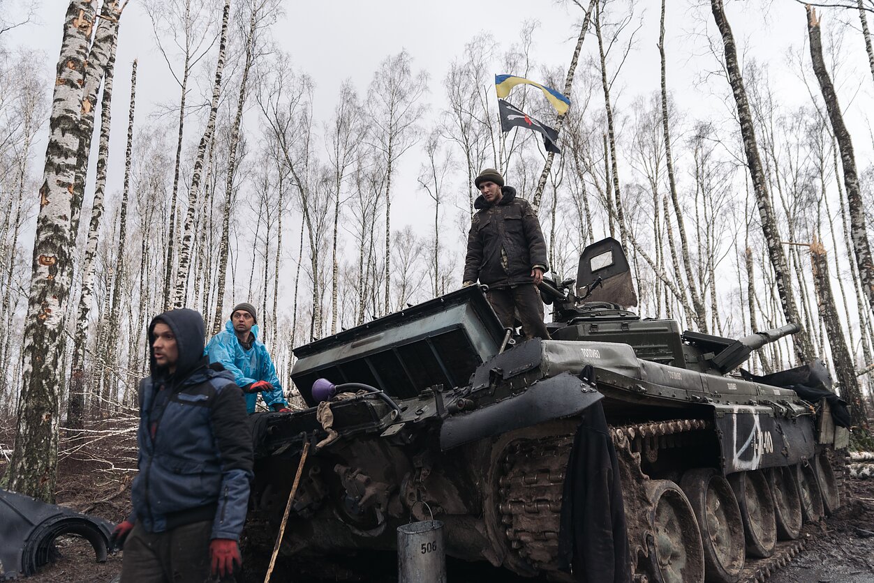 Volunteers in Chernihiv, one of the first cities to be attacked in northern Ukraine, recover an abandoned Russian tank.