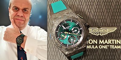 „Girard-Perregaux Laureato Absolute Chronograph Aston Martin F1 Edition“. Riboto kiekio serija – 306 vienetų, korpuso diametras 44 mm, antirefleksinis safyro kristalas iš abiejų pusių. Manufaktūrinis automatinis „GP03300-1058“ chronografo mechanizmas, 419 dalių, galios atsarga 46 val. 