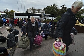 Rusų iš Chersono per prievartą į Krymą deportuojami ukrainiečiai