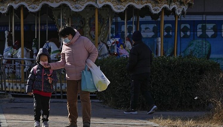 Perpildyti morgai ir cenzūruojama mirčių statistika: Kinijoje prognozuojamas didžiausias iki šiol COVID-19 protrūkis