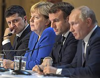 Minsko derybos. Volodymyras Zelenskis, Angela Merkel, Emmanuelis Macronas, Vladimiras Putinas Minsko derybos. Volodymyras Zelenskis, Angela Merkel, Emmanuelis Macronas, Vladimiras Putinas