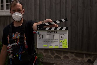Akimirka iš „Poeto“ filmavimo aikštelės