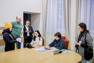 Учні на курсах литовської у Будинку національних громад