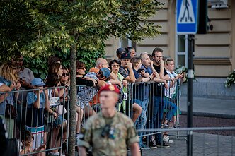 People crowding outside the hotel of US President Joe Biden in Vilnius