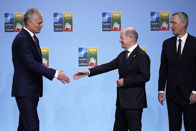 Gitanas Nausėda, Jens Stoltenberg, and German Chancellor Olaf Scholz Gitanas Nausėda, Jens Stoltenberg, and German Chancellor Olaf Scholz