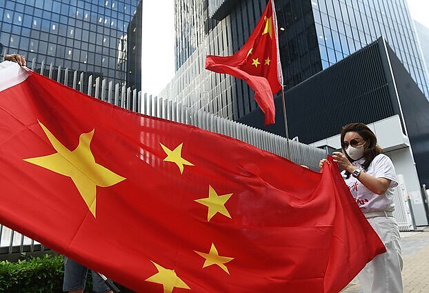 Pasaulis su nerimu stebi Kinijos ekonomiką: signalus apie krizę siunčia nekilnojamojo turto kompanijų būklė