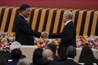 Xi Jinpingas ir Vladimiras Putinas Xi Jinpingas ir Vladimiras Putinas