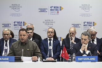 Andrijus Jermakas Davose (kairėje) Andrijus Jermakas Davose (kairėje)
