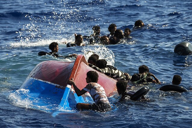 Migrantai šalia Lampedūzos